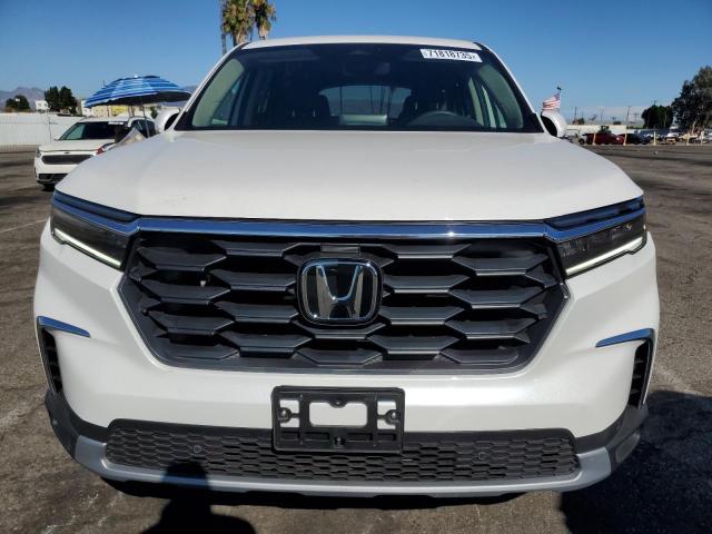 Photo 5 from auction – 2025 HONDA PILOT EXL with VIN 5FNYG2H47SB029856