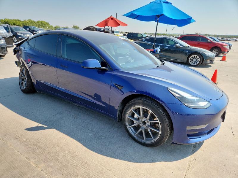 Photo 4 from auction – 2023 TESLA MODEL 3 with VIN 5YJ3E1EA4PF559665