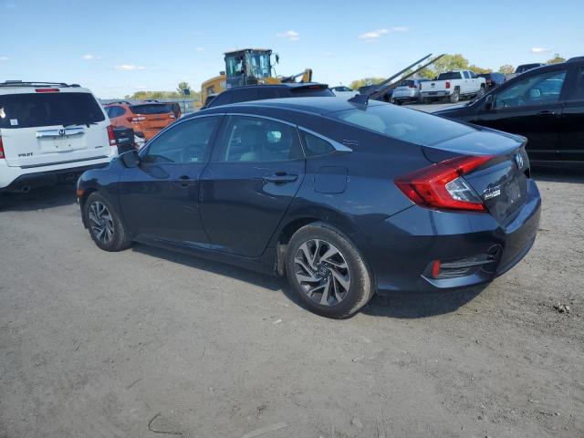 Photo 2 from auction – 2018 HONDA CIVIC EX with VIN 19XFC2F73JE028465
