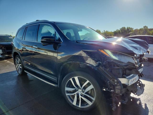 Photo 4 from auction – 2016 HONDA PILOT TOUR with VIN 5FNYF6H96GB003066