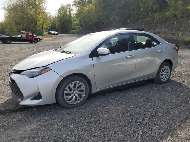TOYOTA COROLLA L 2017 with VIN 5YFBURHE7HP703002 - Photo from auction