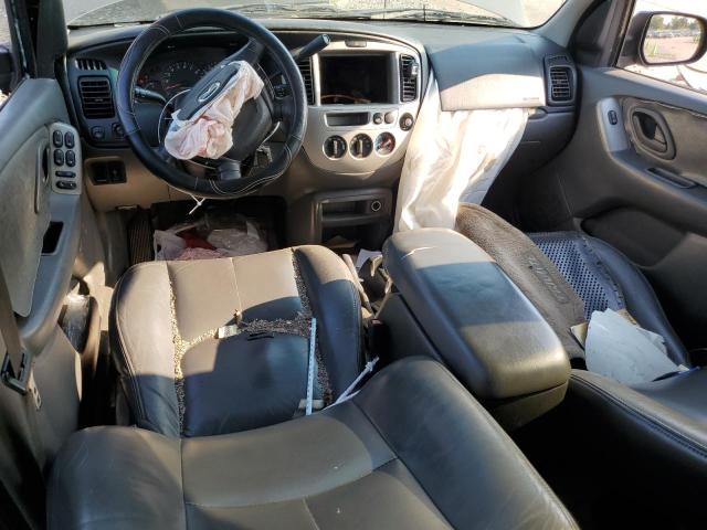 Photo 8 from auction – 2003 MAZDA TRIBUTE ES with VIN 4F2CZ06163KM04237