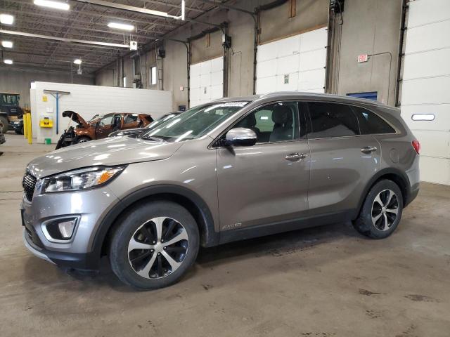 KIA SORENTO EX 2016 with VIN 5XYPHDA53GG116869 - Photo from auction