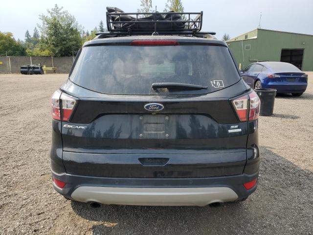 Photo 6 from auction – 2018 FORD ESCAPE SE with VIN 1FMCU0GD4JUC91389