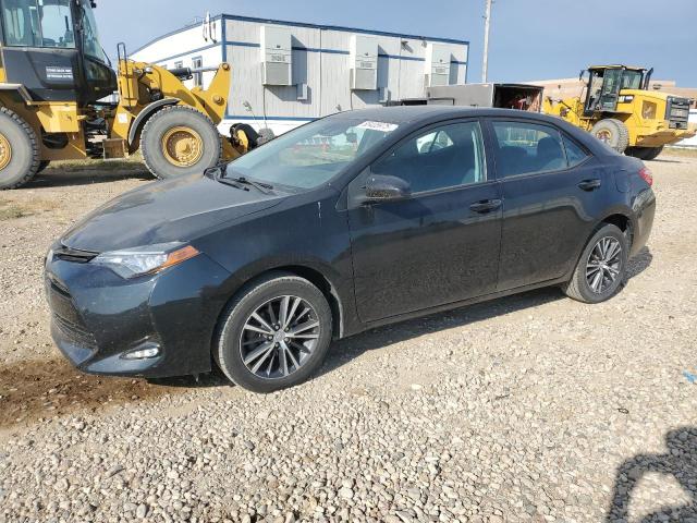 TOYOTA COROLLA L 2017 with VIN 5YFBURHE6HP590966 - Photo from auction