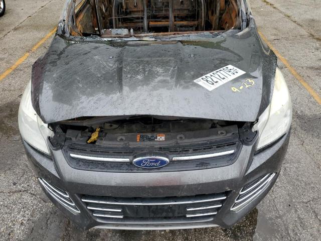 Photo 12 from auction – 2015 FORD ESCAPE with VIN 1FMCU0GX4FUB56396