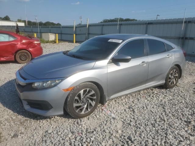 HONDA CIVIC EX 2017 with VIN 19XFC2F76HE003828 - Photo from auction