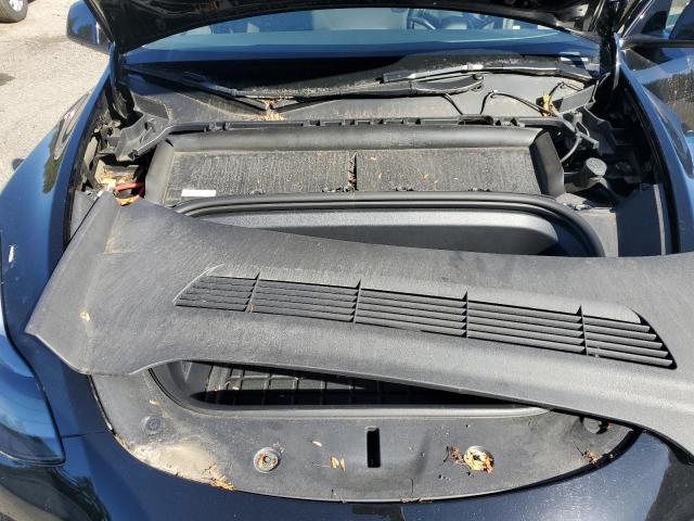 Photo 12 from auction – 2023 TESLA MODEL Y with VIN 7SAYGDEE9PF910822