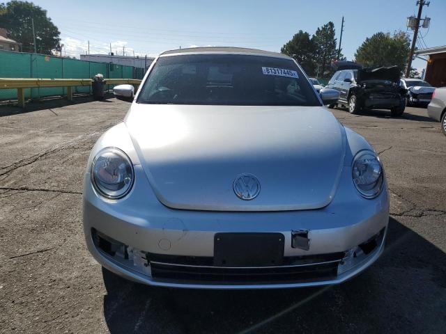 Photo 5 from auction – 2014 VOLKSWAGEN BEETLE with VIN 3VW507AT8EM813157