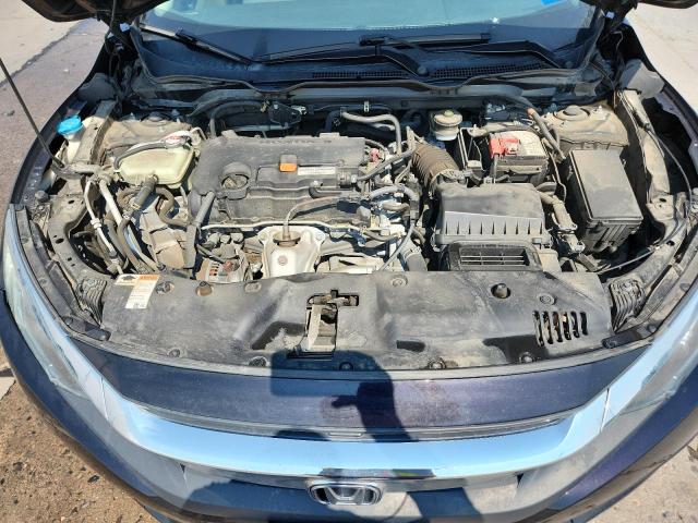 Photo 11 from auction – 2018 HONDA CIVIC with VIN 2HGFC2F54JH591318