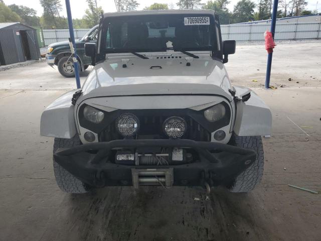 Photo 5 from auction – 2016 JEEP WRANGLER U with VIN 1C4BJWEG8GL274232