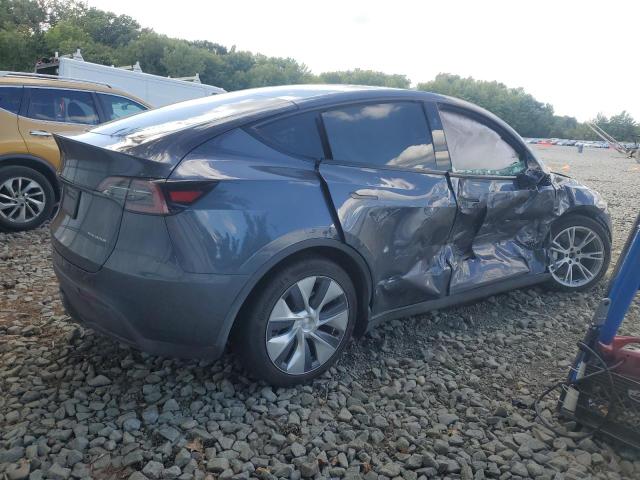 Photo 3 from auction – 2023 TESLA MODEL Y with VIN 7SAYGAEE7PF843054