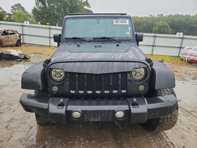 Photo 5 from auction – 2011 JEEP WRANGLER U with VIN 1J4HA5H10BL530149