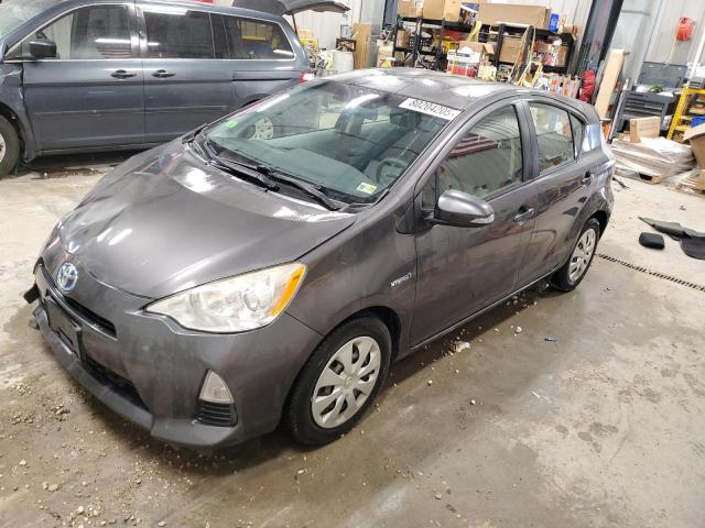 TOYOTA PRIUS C 2014 with VIN JTDKDTB35E1073470 - Photo from auction
