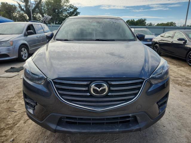 Photo 5 from auction – 2016 MAZDA CX-5 GT with VIN JM3KE2DY8G0723103