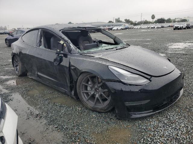 Photo 4 from auction – 2022 TESLA MODEL 3 with VIN 5YJ3E1EB3NF335535
