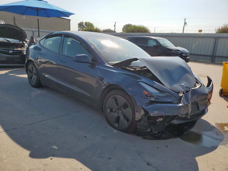 Photo 4 from auction – 2022 TESLA MODEL 3 with VIN 5YJ3E1EB3NF323840