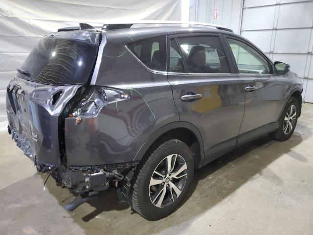 Photo 3 from auction – 2017 TOYOTA RAV4 XLE with VIN JTMRFREV6HJ710041