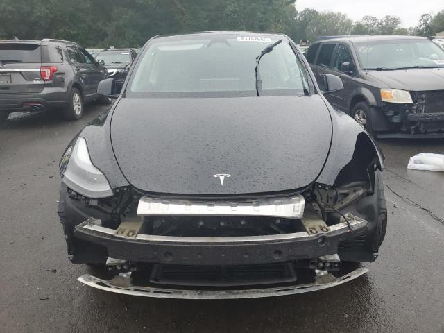 Photo 5 from auction – 2023 TESLA MODEL Y with VIN 7SAYGDEE4PF831543