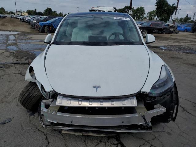 Photo 5 from auction – 2023 TESLA MODEL Y with VIN 7SAYGAEE1PF944168