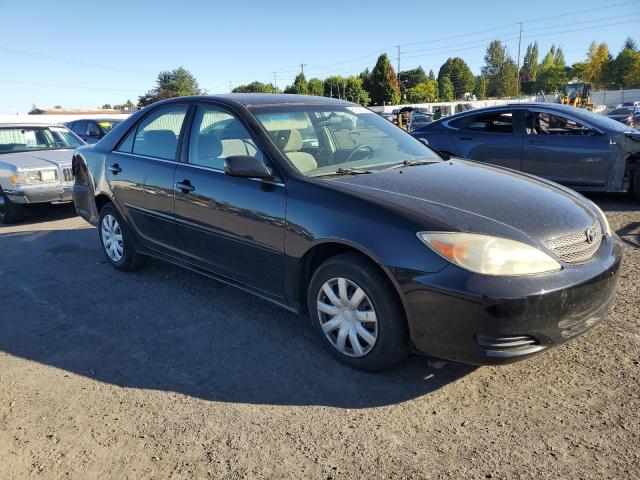 Photo 4 from auction – 2002 TOYOTA CAMRY LE with VIN JTDBE32K720015740