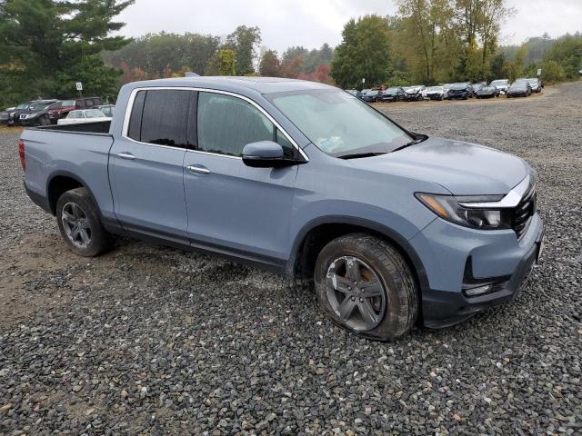 Photo 4 from auction – 2023 HONDA RIDGELINE with VIN 5FPYK3F79PB013965