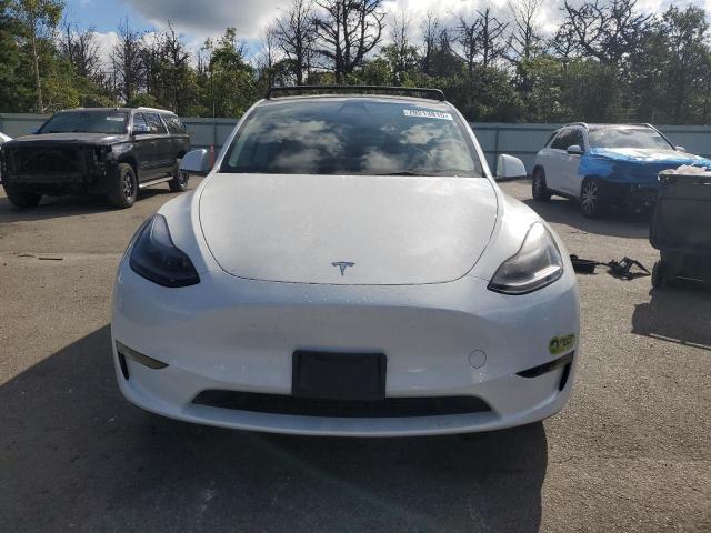 Photo 5 from auction – 2023 TESLA MODEL Y with VIN 7SAYGAEE7PF752625