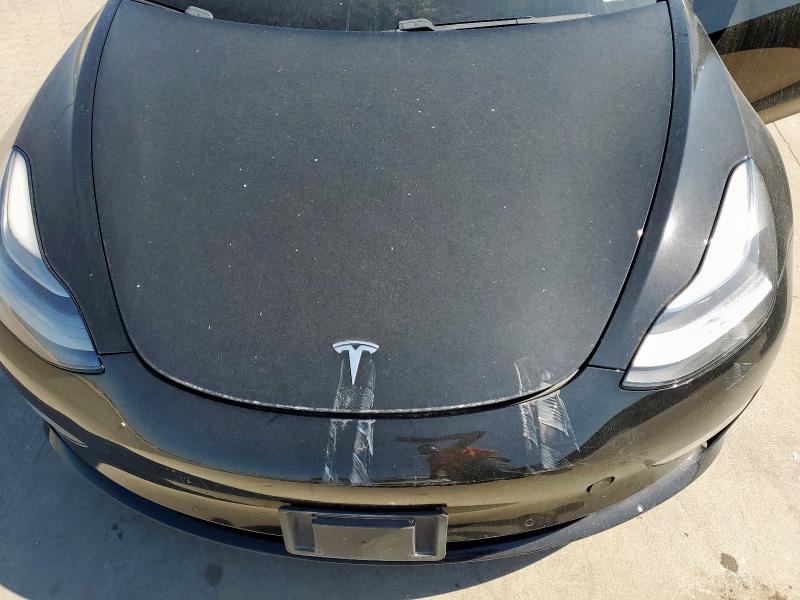 Photo 11 from auction – 2021 TESLA MODEL 3 with VIN 5YJ3E1EB4MF919036