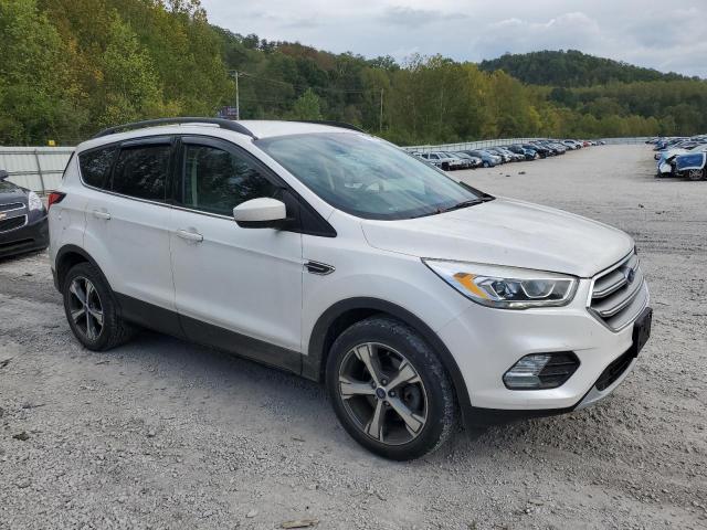 Photo 4 from auction – 2017 FORD ESCAPE SE with VIN 1FMCU9G92HUE04878