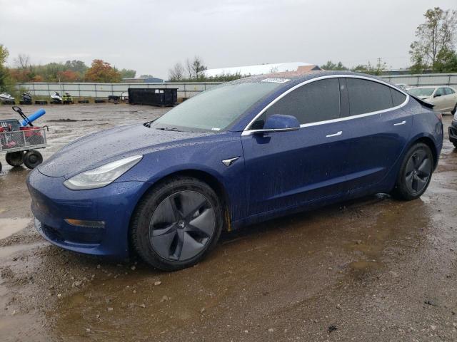 TESLA MODEL 3 2018 with VIN 5YJ3E1EB2JF105401 - Photo from auction