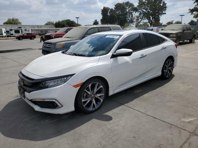 HONDA CIVIC TOURING 2019 with VIN 19XFC1F91KE200070 - Photo from auction