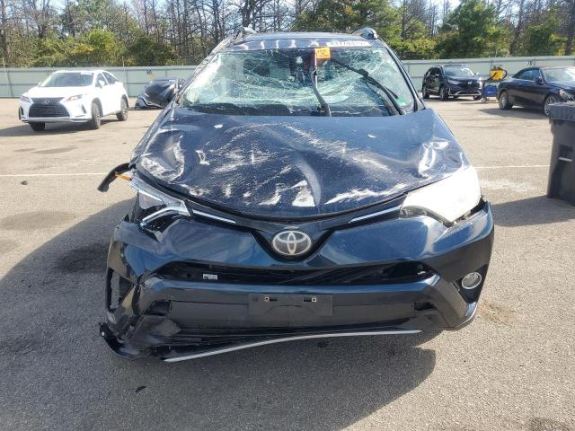 Photo 5 from auction – 2017 TOYOTA RAV4 XLE with VIN JTMRFREV5HD210578