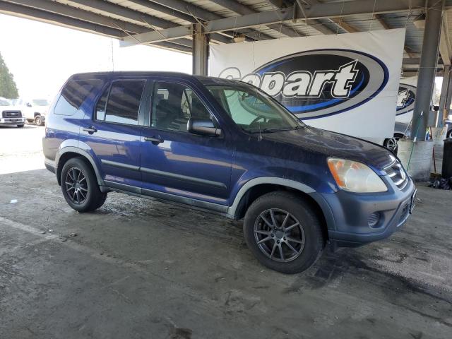 Photo 4 from auction – 2005 HONDA CR-V LX with VIN JHLRD68505C010972