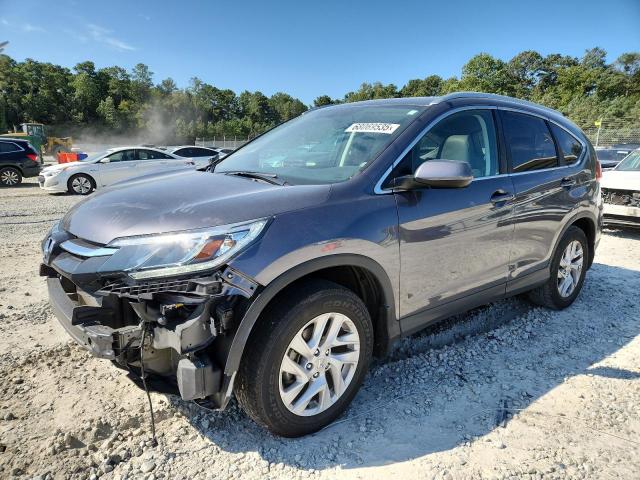 Photo 1 from auction – 2015 HONDA CR-V with VIN 2HKRM3H79FH542739