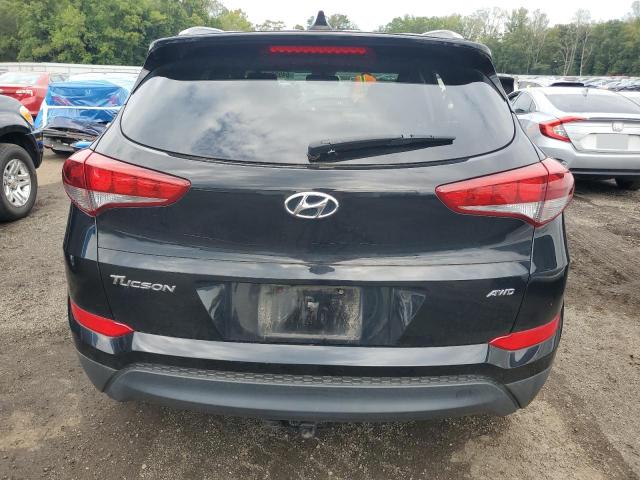 Photo 6 from auction – 2018 HYUNDAI TUCSON SEL with VIN KM8J3CA48JU651283
