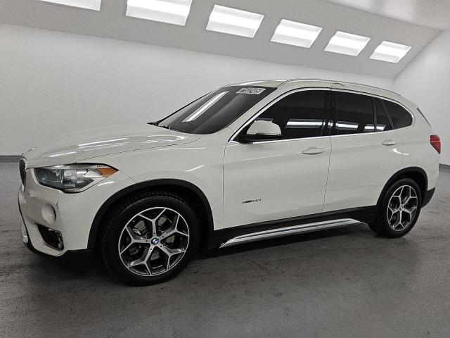 BMW X1 XDRIVE2 2018 with VIN WBXHT3C31J5F89149 - Photo from auction