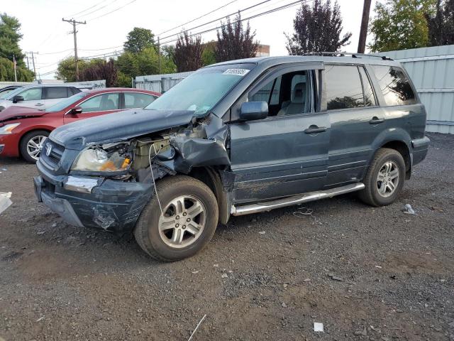 HONDA PILOT EXL 2004 with VIN 2HKYF18724H563178 - Photo from auction