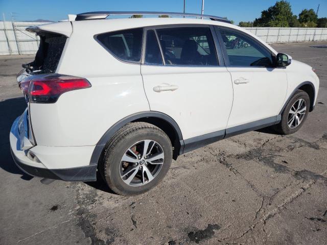 Photo 3 from auction – 2017 TOYOTA RAV4 XLE with VIN JTMRFREV3HJ106978