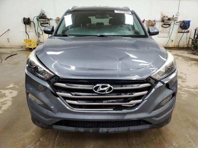 Photo 5 from auction – 2016 HYUNDAI TUCSON LIM with VIN KM8J33A46GU206579