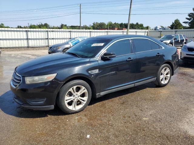 FORD TAURUS SEL 2014 with VIN 1FAHP2E85EG127694 - Photo from auction