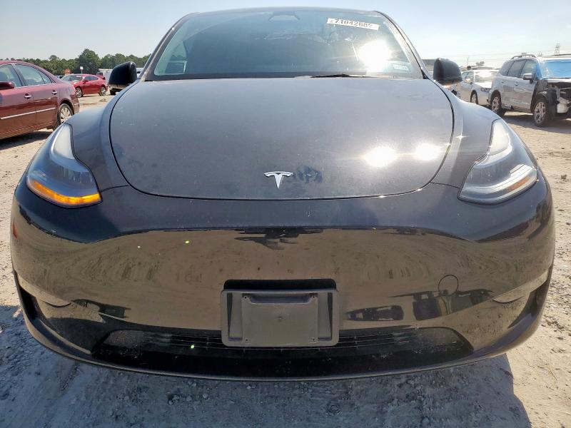 Photo 5 from auction – 2023 TESLA MODEL Y with VIN 7SAYGDEE0PF631534