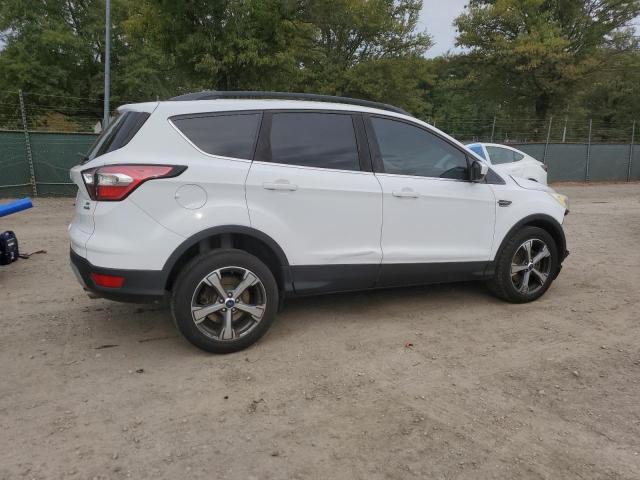 Photo 3 from auction – 2017 FORD ESCAPE SE with VIN 1FMCU9G92HUB94279