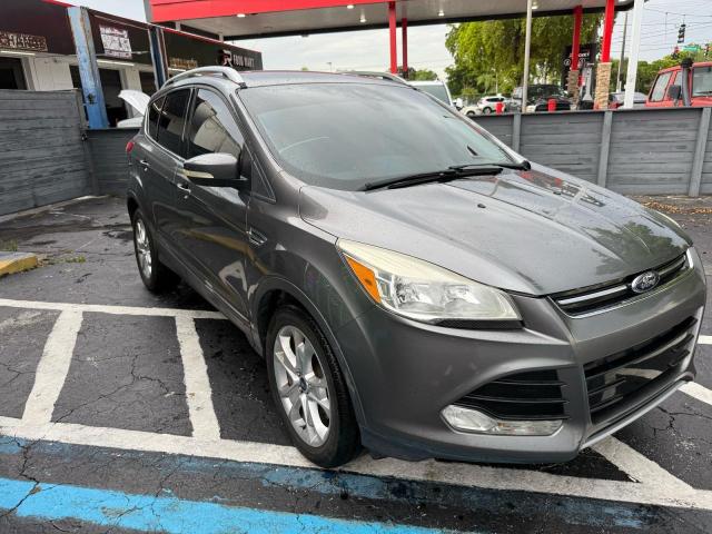 FORD ESCAPE TIT 2014 with VIN 1FMCU0JX4EUC57204 - Photo from auction