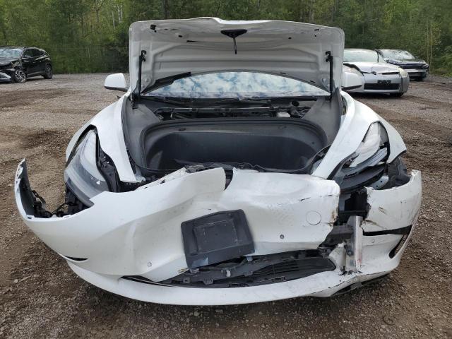 Photo 5 from auction – 2021 TESLA MODEL 3 with VIN 5YJ3E1EA2MF962605
