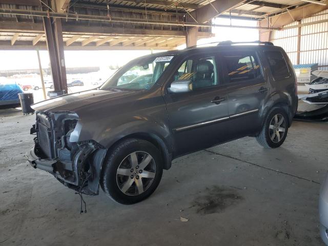 HONDA PILOT TOURING 2012 with VIN 5FNYF3H92CB024327 - Photo from auction