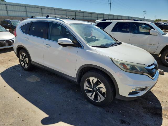 Photo 4 from auction – 2015 HONDA CR-V TOURING with VIN 5J6RM4H97FL067413