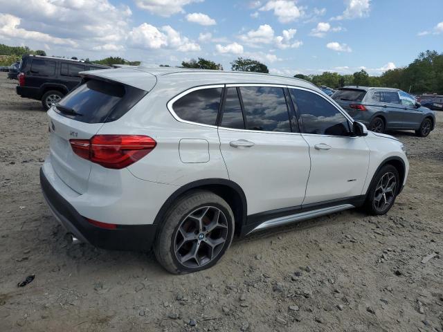 Photo 3 from auction – 2018 BMW X1 XDRIVE2 with VIN WBXHT3C35J5K27225
