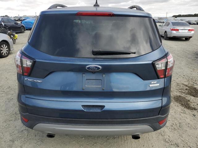 Photo 6 from auction – 2018 FORD ESCAPE SE with VIN 1FMCU0GD1JUC09845