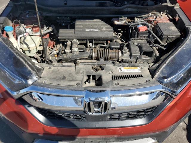 Photo 11 from auction – 2018 HONDA CR-V with VIN 2HKRW1H53JH500623