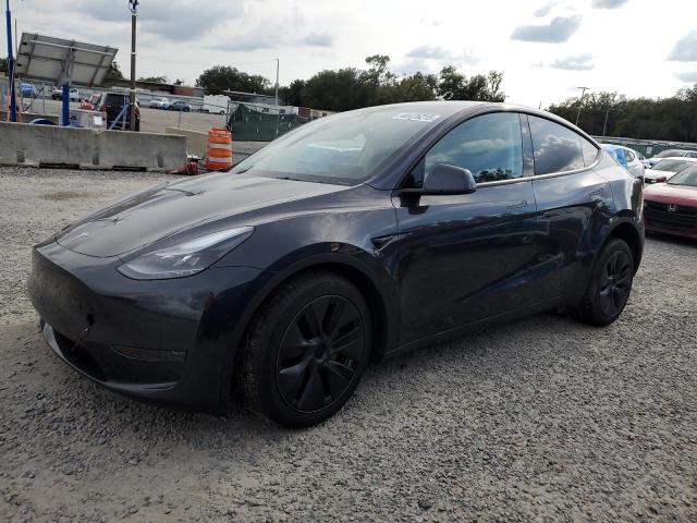 TESLA MODEL Y 2024 with VIN 7SAYGDED5RF209494 - Photo from auction